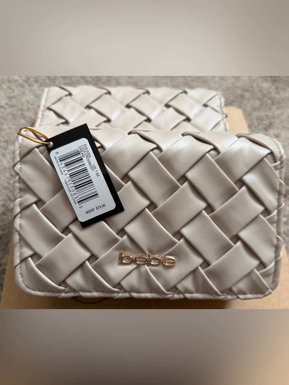 bebe Cream Woven Clutch with Gold Logo